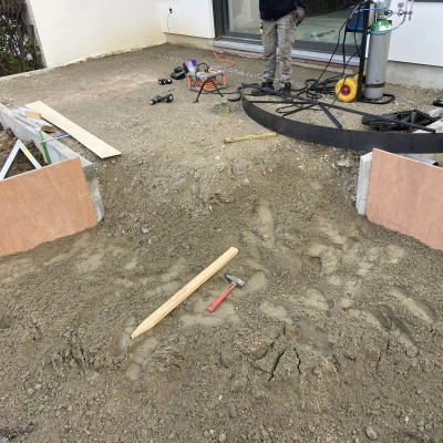 Terras uitgewassen beton met beige kasteelgrind