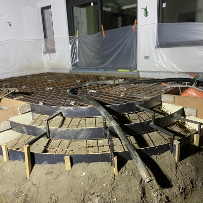Terras uitgewassen beton met beige kasteelgrind